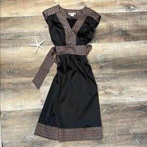 Elegant Black Dress with Geometric Trim